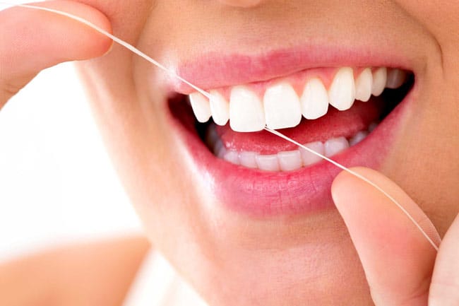 reduce risk of decay by flossing