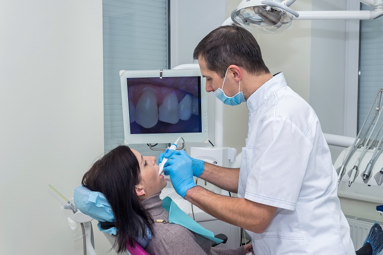 dentist doing dental implant